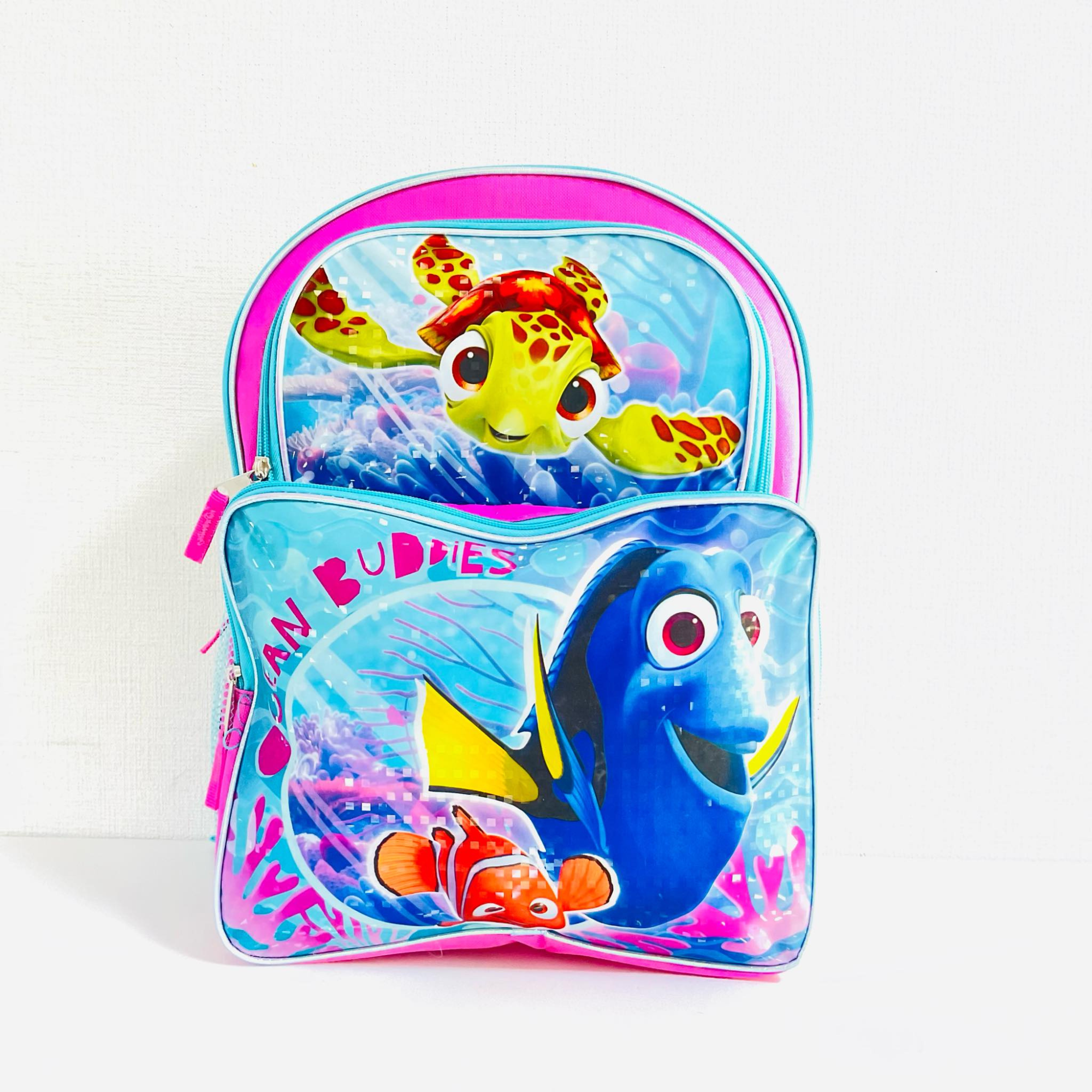 Mochila Dory-Bolsillo En La Frente